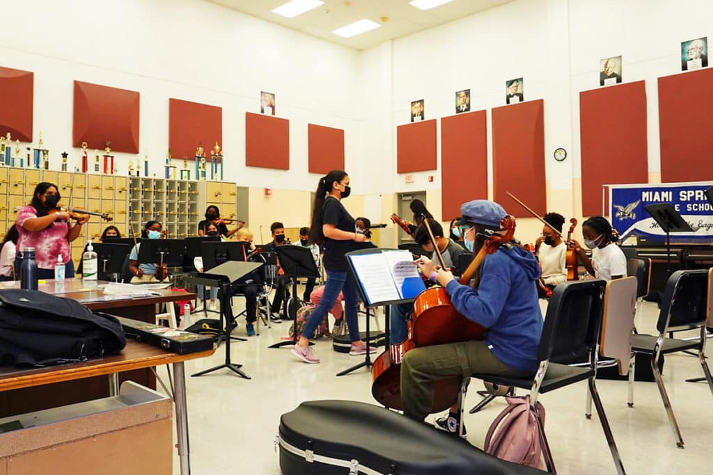 Miami Music Project string students playing with their instruments during Summer Music Camp 2021 in Miami.